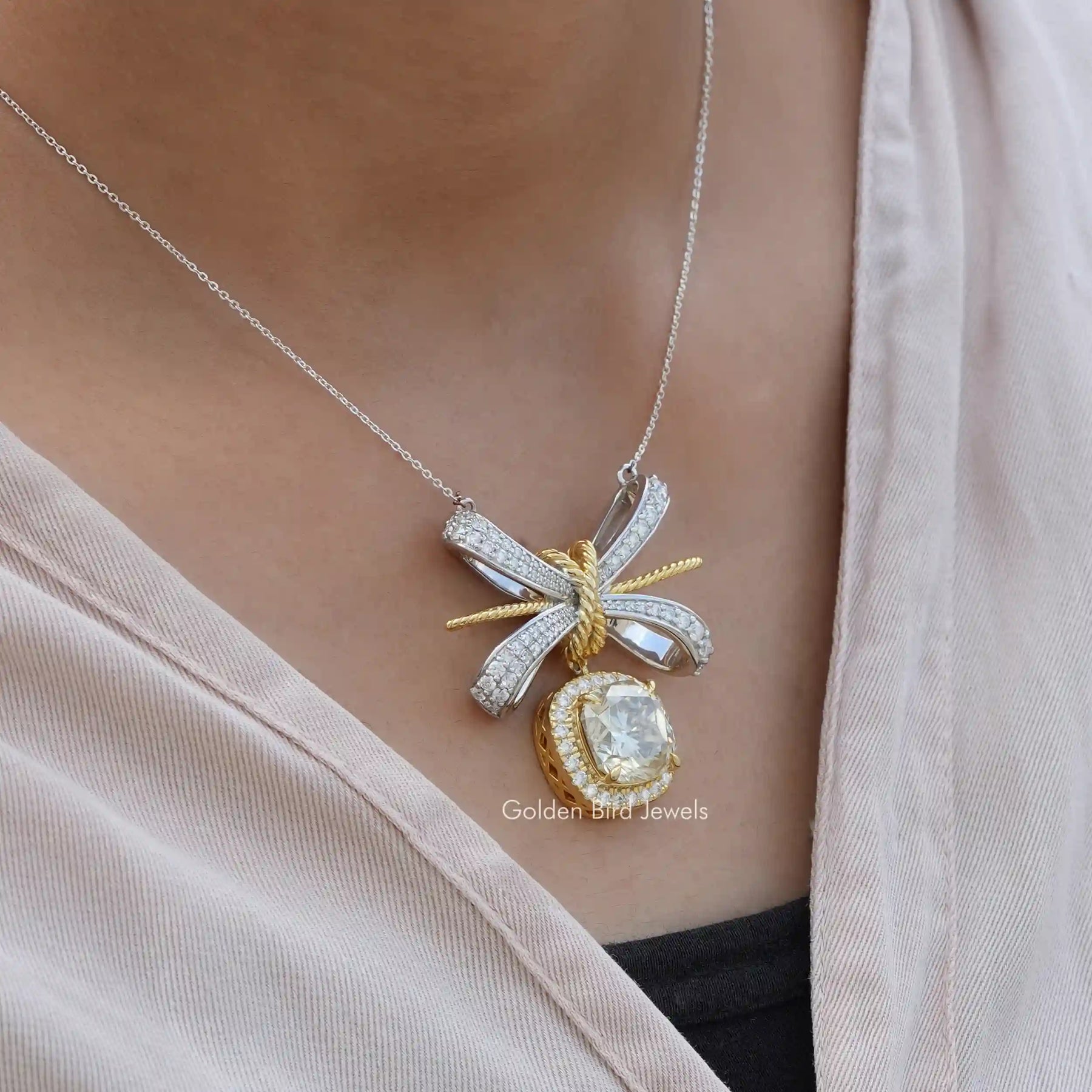 Side view of cushion cut pendant In white Gold