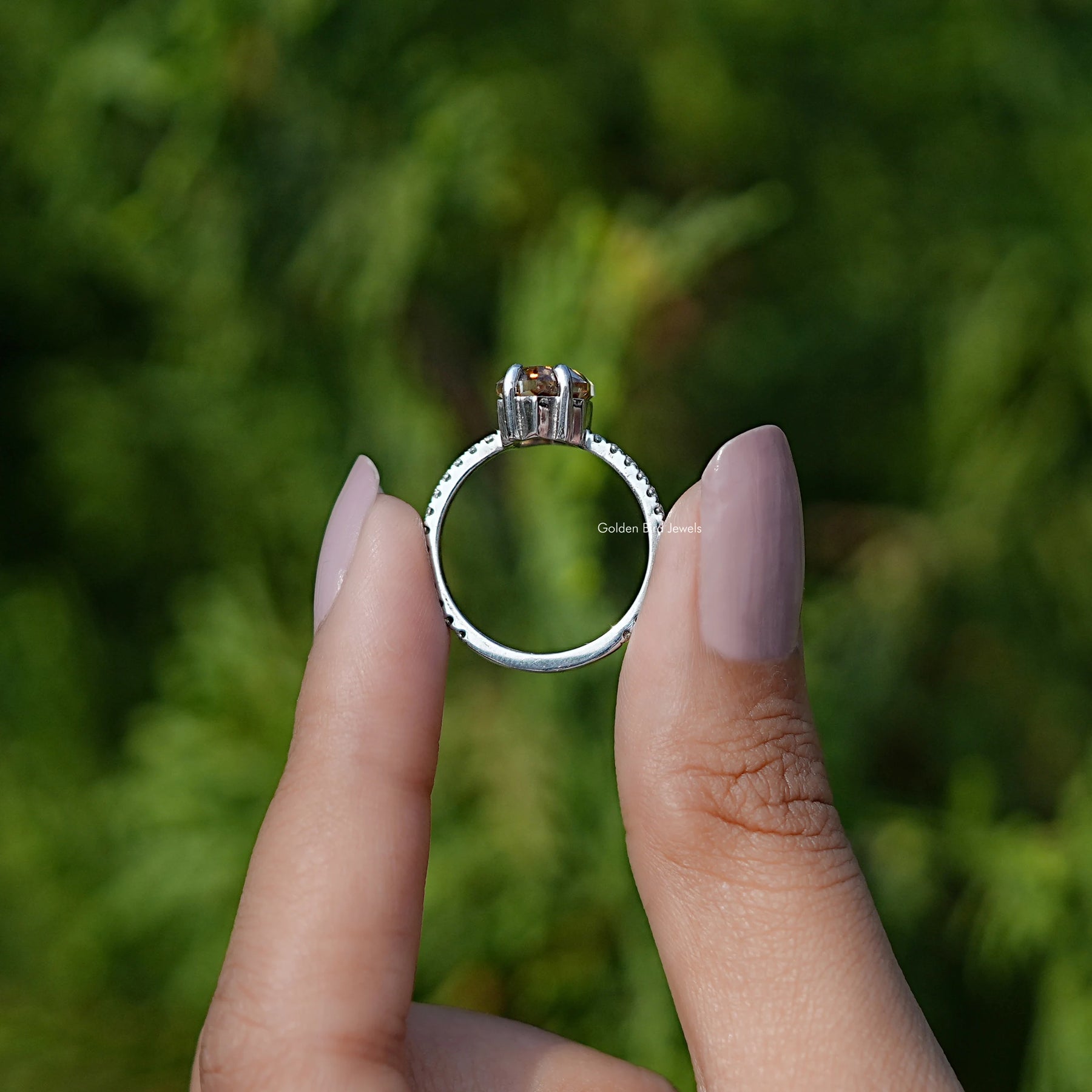 Back view of solitaire marquise cut  ring 
