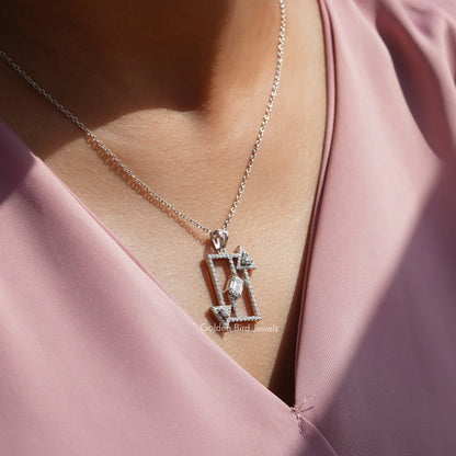 In neck front view of moissanite emerald cut pendant