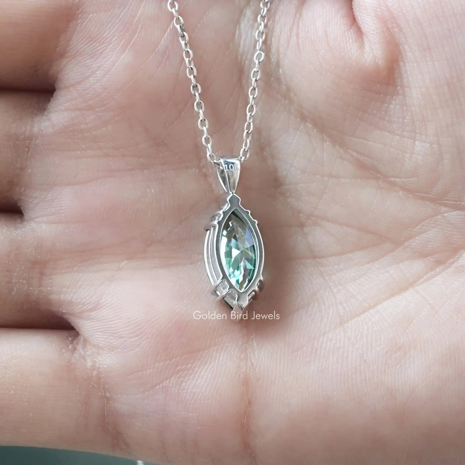 Back view of marquise cut solitaire pendant