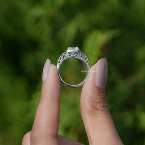 Back View of Moissanite Old Cut European Round Halo Ring In two fingers