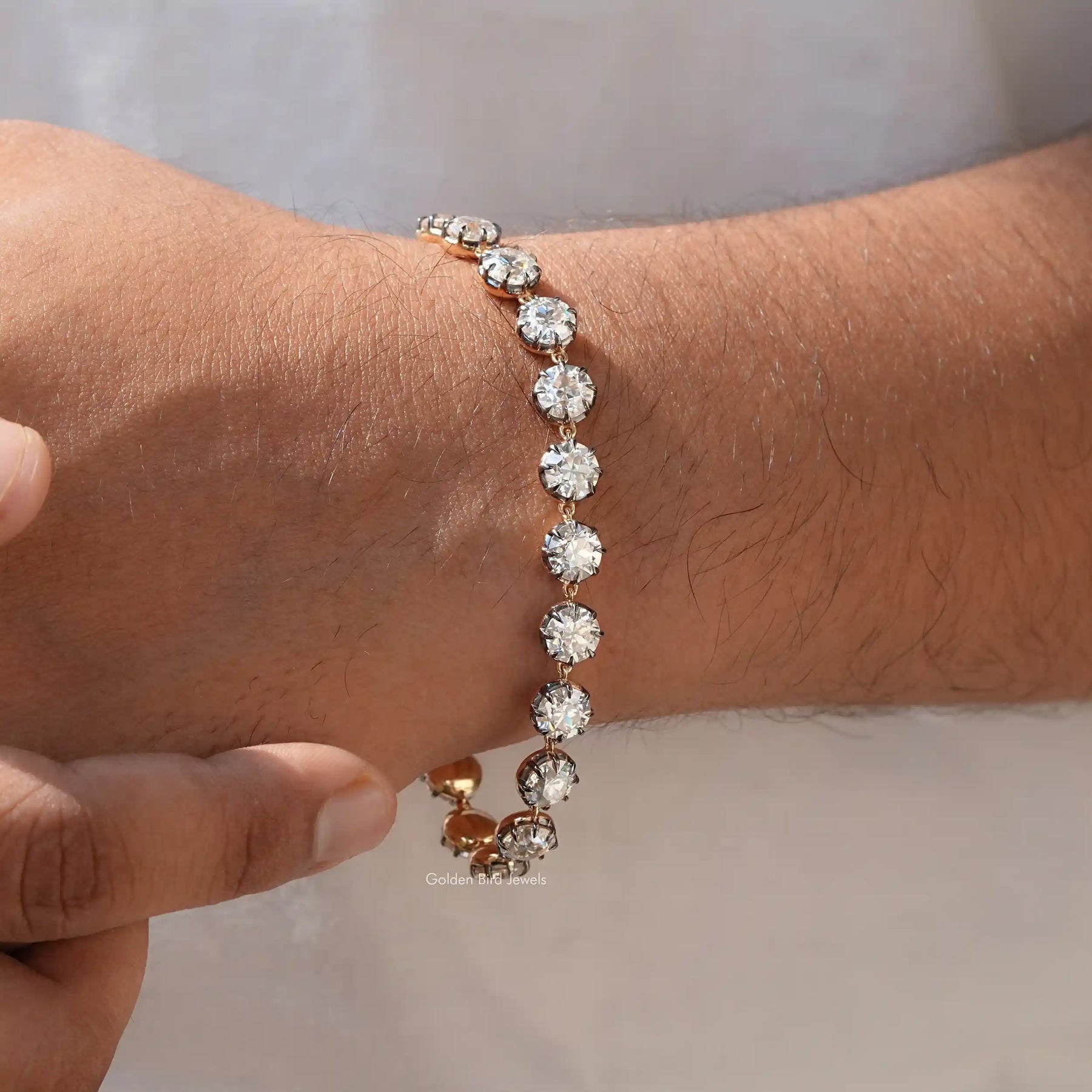 In hand showing view of moissanite Bracelet	 		