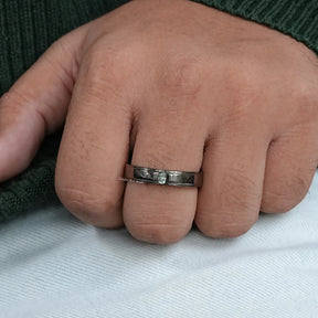 In hand showing view of moissanite Ring	 		