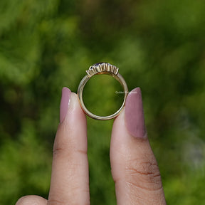 Back View of Rose Cut Pear Vintage Curved Ring In two fingers