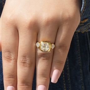 View of Moissanite Old Mine Cushion Cut 3 Stone Ring In Yellow Gold
