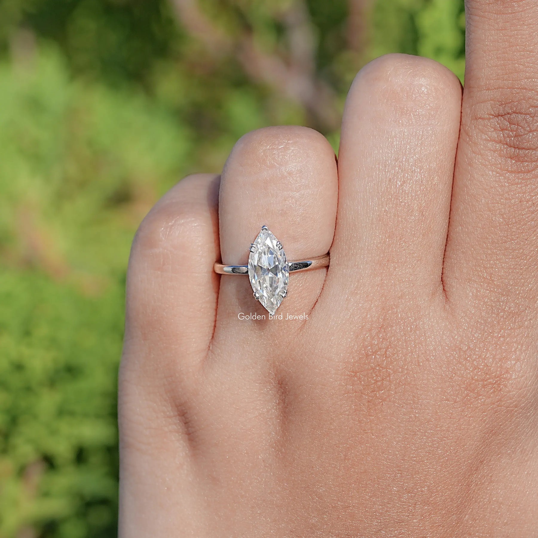 Near Colorless Old Mine Marquise Moissanite Ring