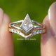 Kite Cut Lab Diamond Bridal Ring Set Held Between Fingers