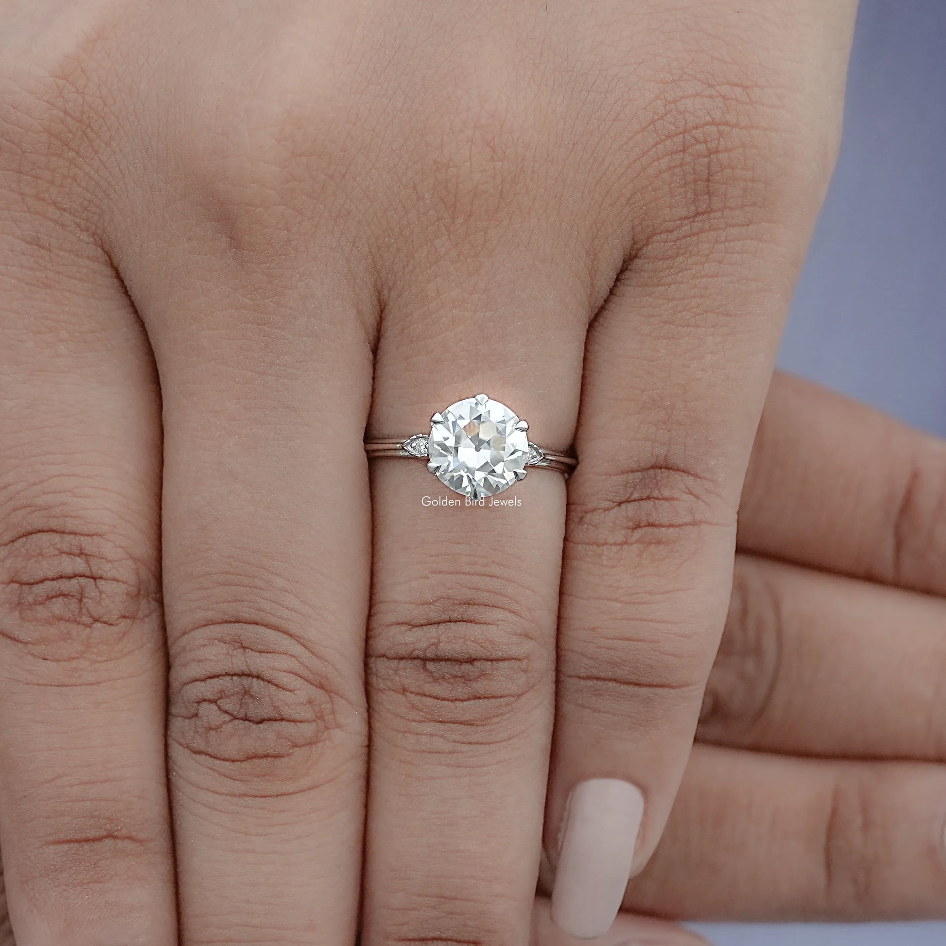 View of Round Cut Solitaire Engagement Ring in prongs setting