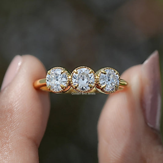 Front view of Old European Cut Round Moissanite Three Stone Ring