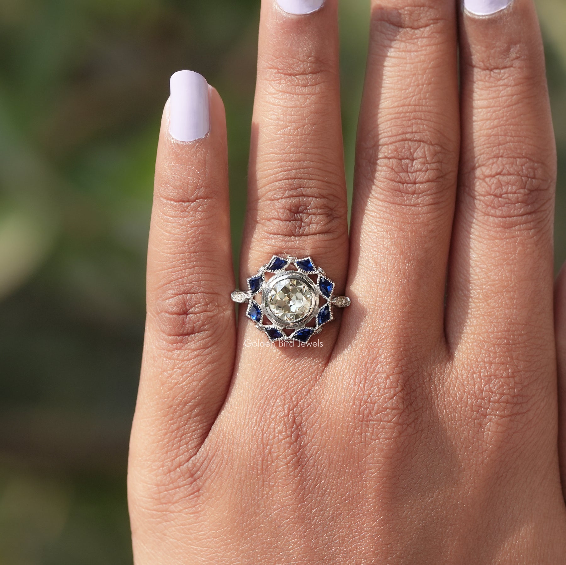 View of Bezel Set Old European Round Cut Moissanite Ring In White Gold