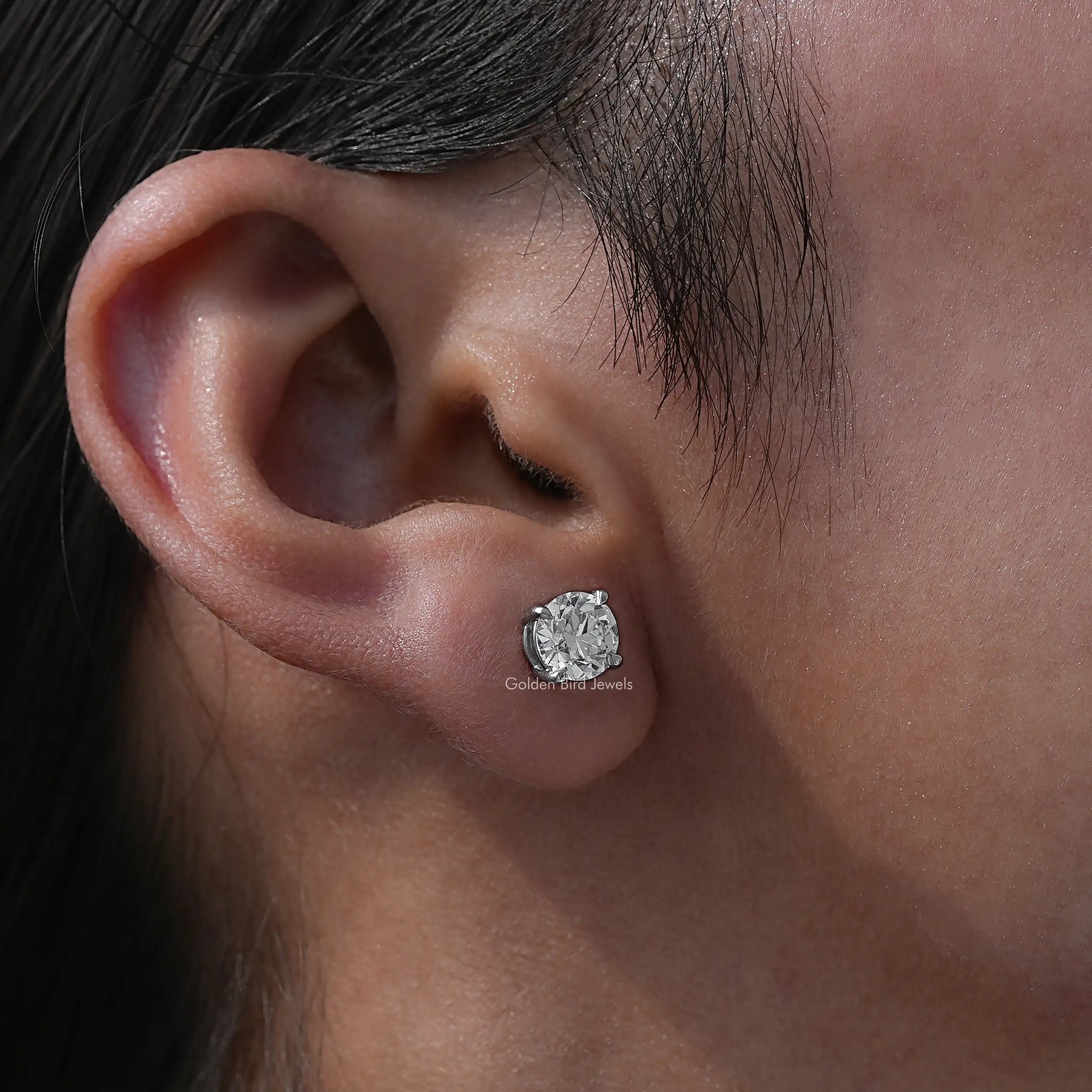 Side View Of Four Prong Set Round Cut Diamond Stud Earrings