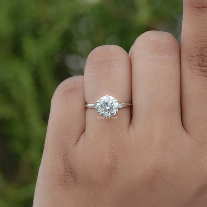 In finger view of Round Cut Solitaire Engagement Ring 