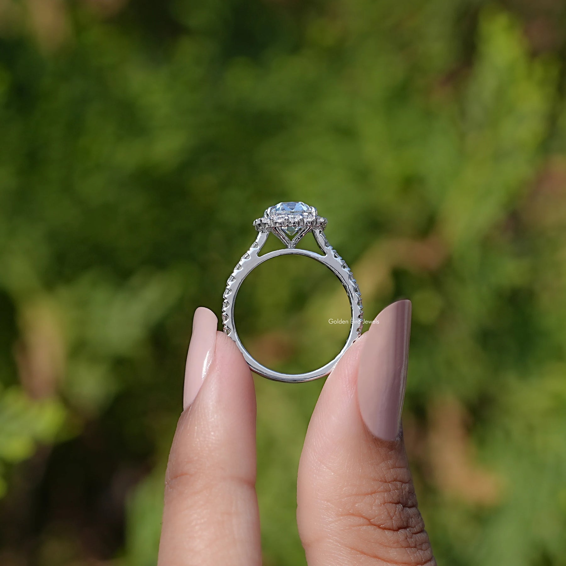 Back view of Cushion Cut Lab Diamond Halo Ring in secure setting 