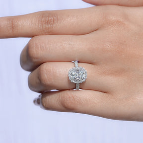 In finger front view of Old Mine Cushion Cut Lab Diamond Halo Ring in unique shape