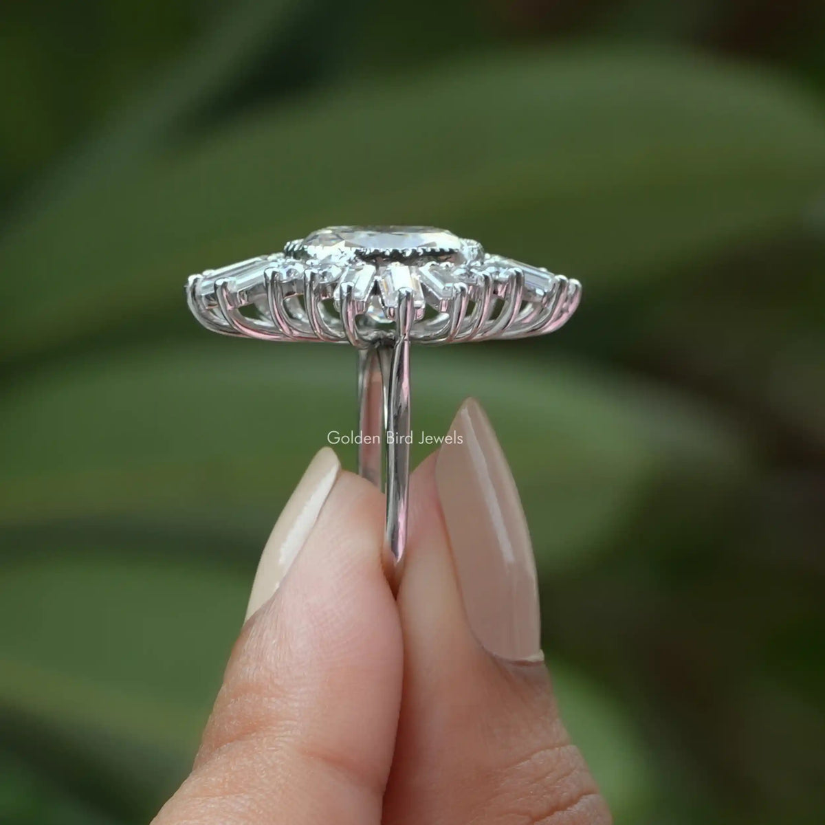 Side View of Old  Cushion Cut Moissanite Engagement Ring In two fingers