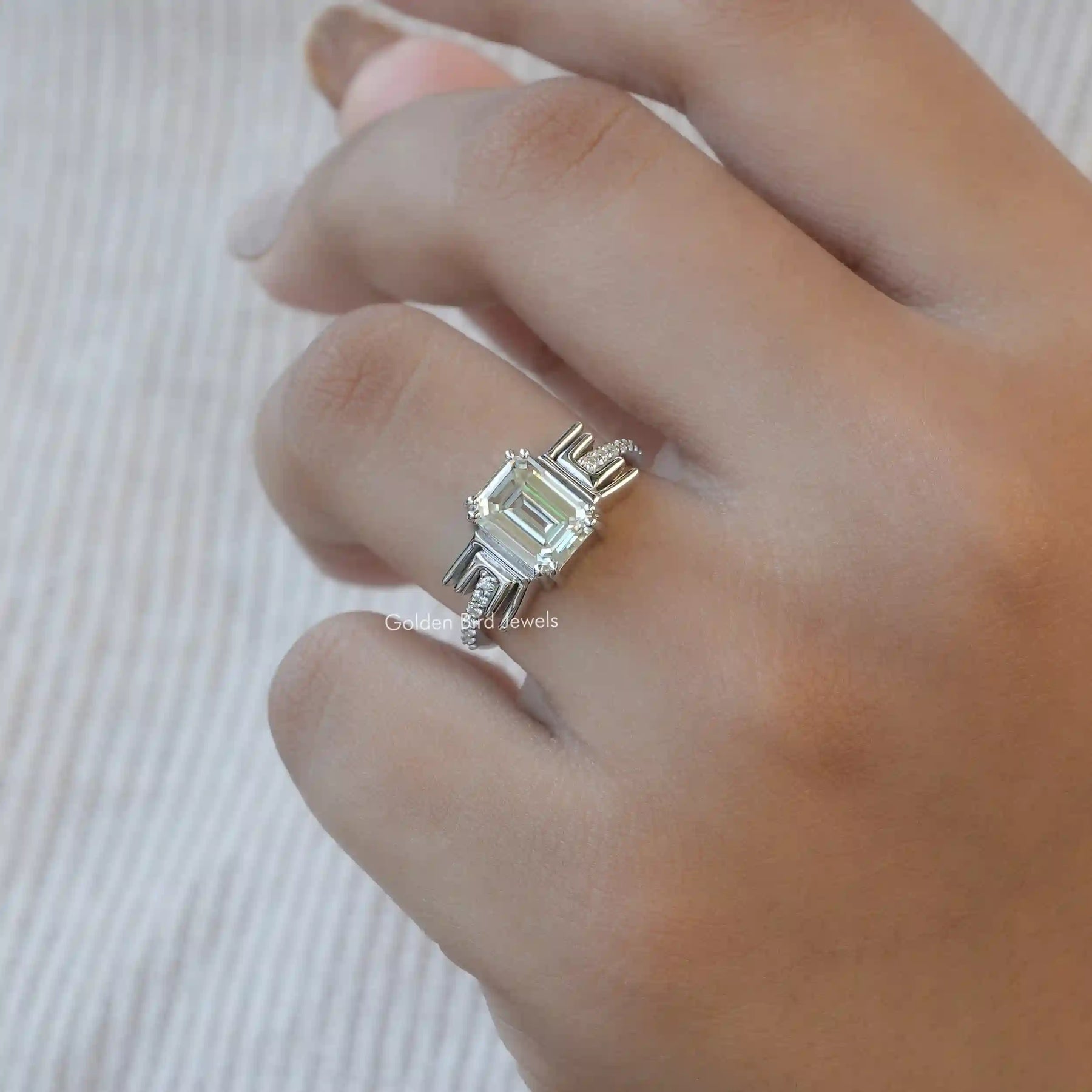 View of Old Mine Emerald Cut Moissanite Ring In Finger