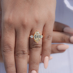 Old Mine Moval And Pear Moissanite Three Stone Ring