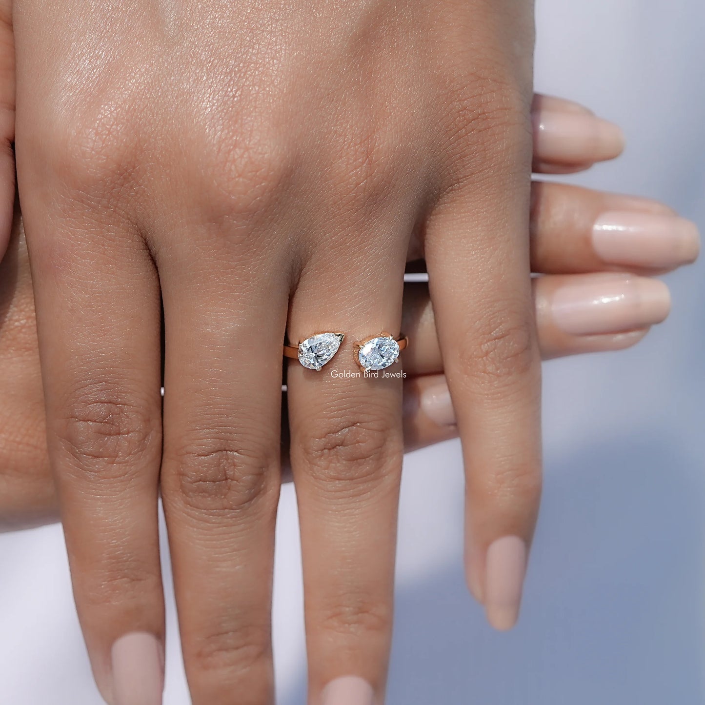 Close view of Pear And Oval Shape Lab Diamond Halo Ring
