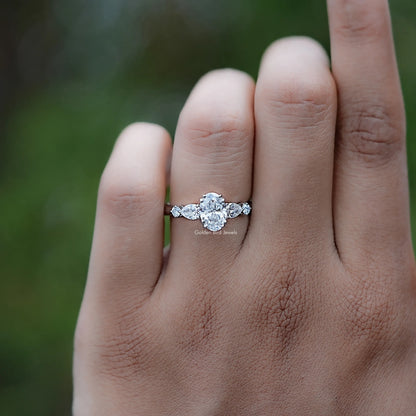 Front view of Oval And Half Moon Diamond Five Stone Ring