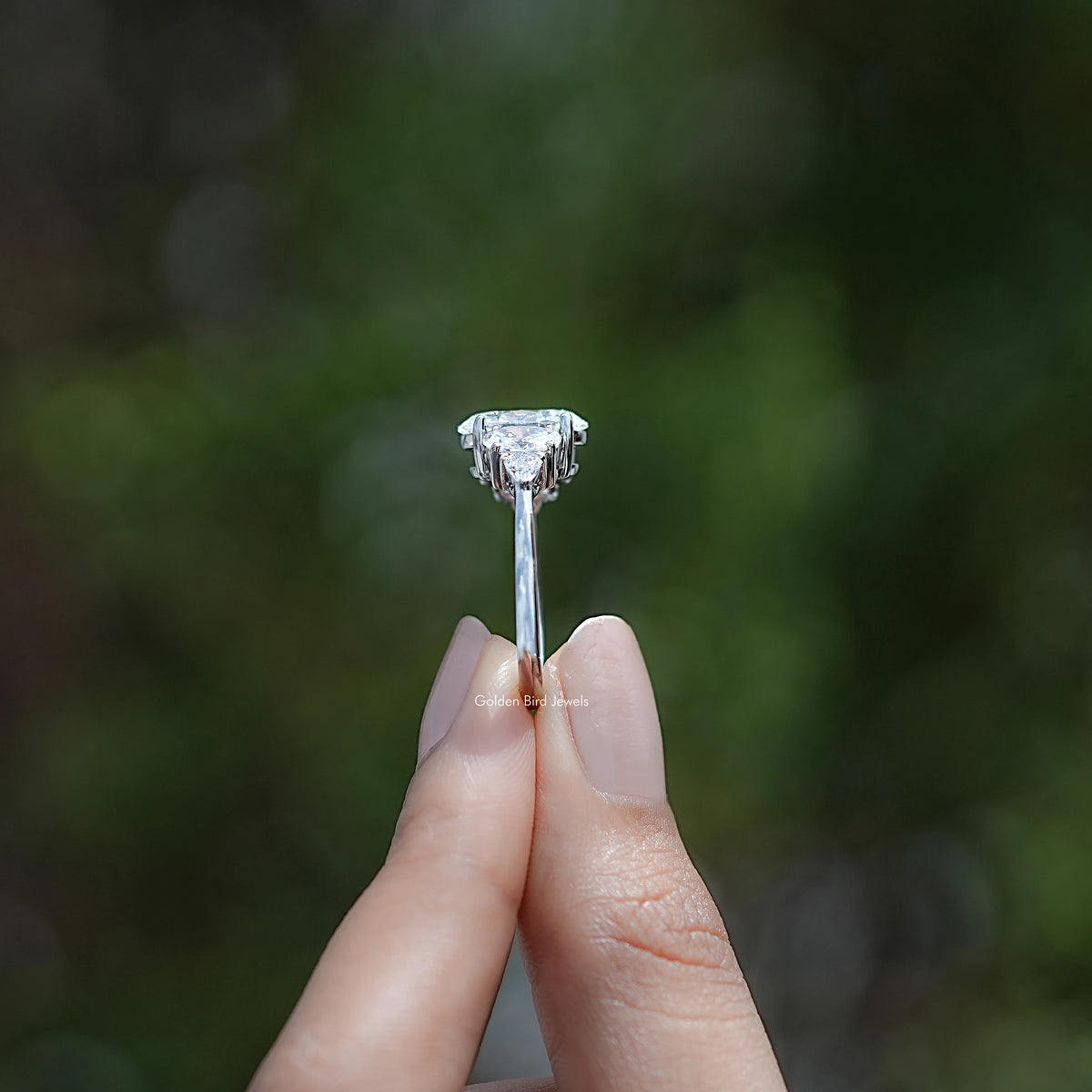 Side View of Oval And Trillion Diamond Five Stone Ring