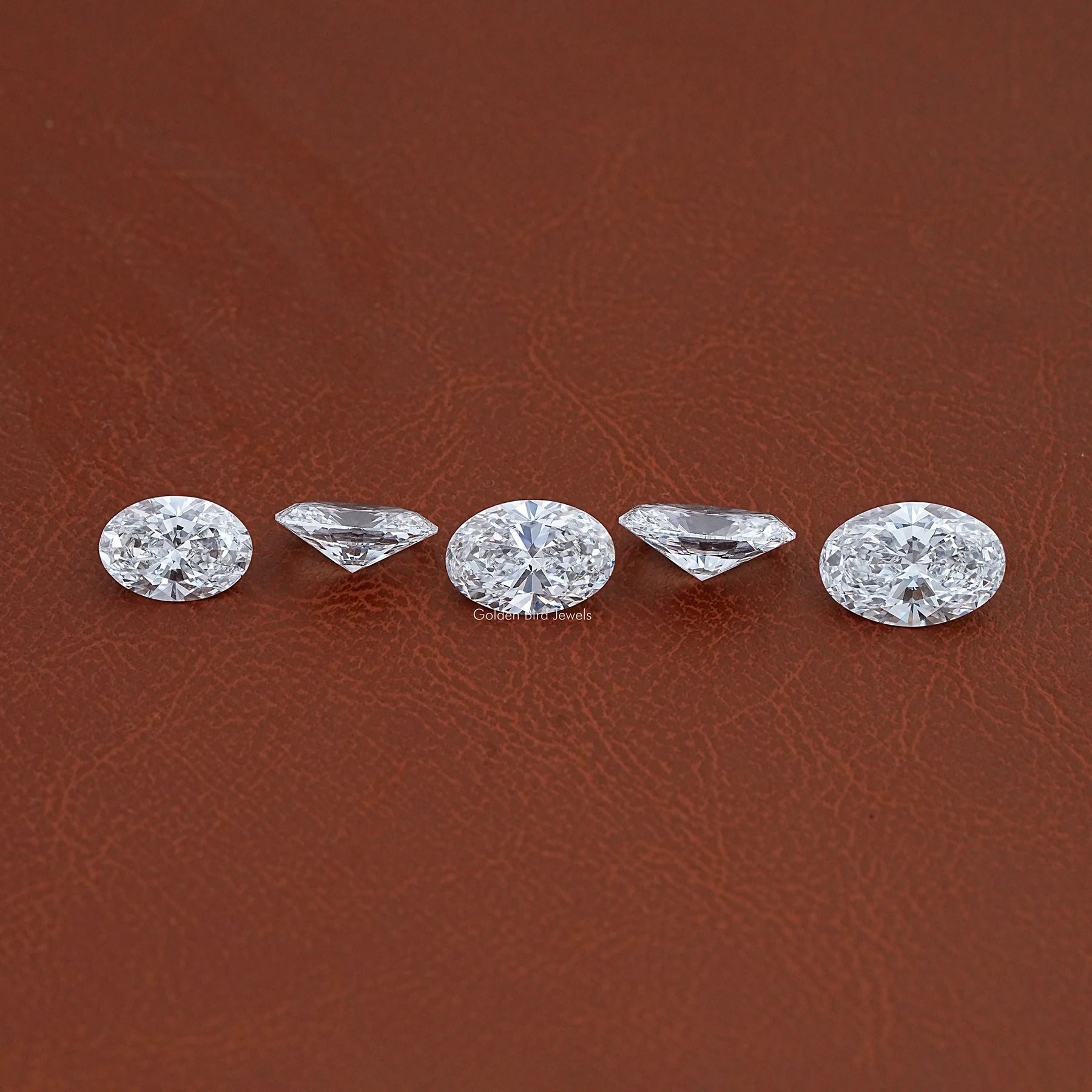 Detailed View Of Oval Cut Lab Loose Diamond in Unique Pattern 
