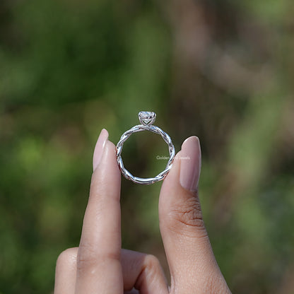 Back view of Oval Shaped Moissanite Twisted Shank Accent Ring in secure setting