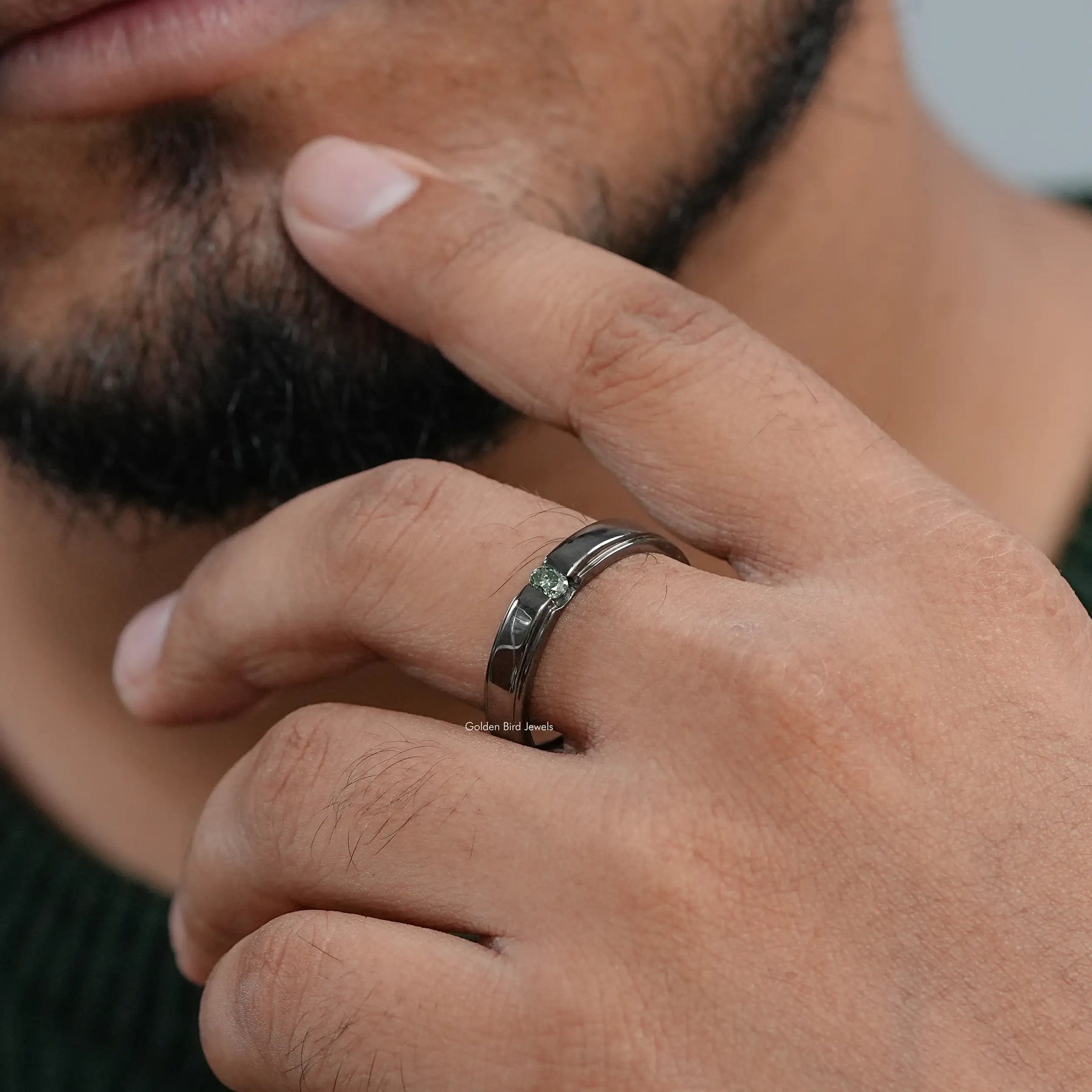 In front view of moissanite green oval cut Ring