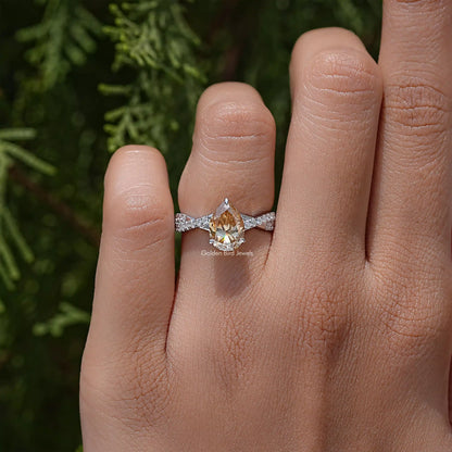 Pear Moissanite Gemstone Twisted Shank Accent Ring