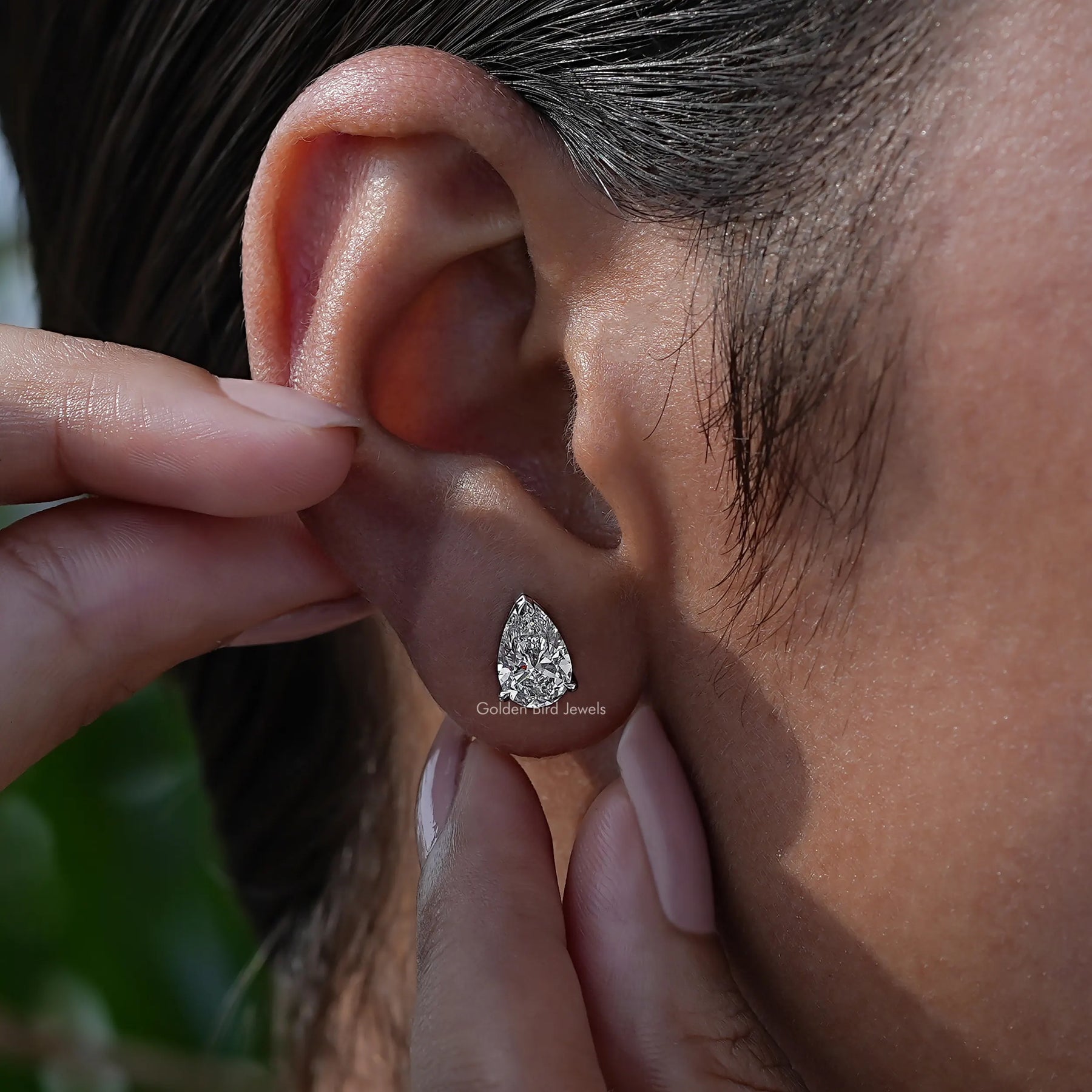 Side View Of Four Prong Set Round Cut  lab diamond Stud Earrings