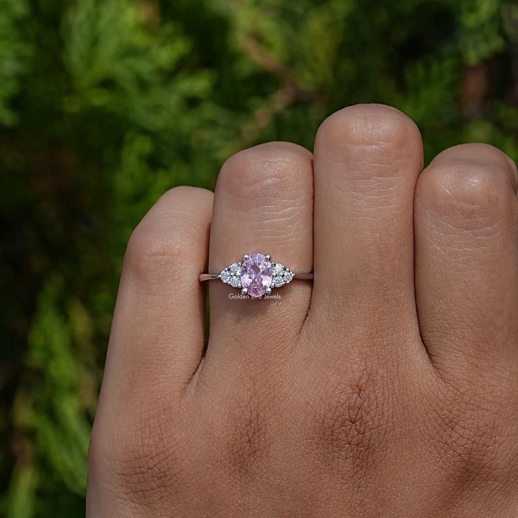 Close-Up View of Gemstone Oval Cut Engagement Ring In White Gold