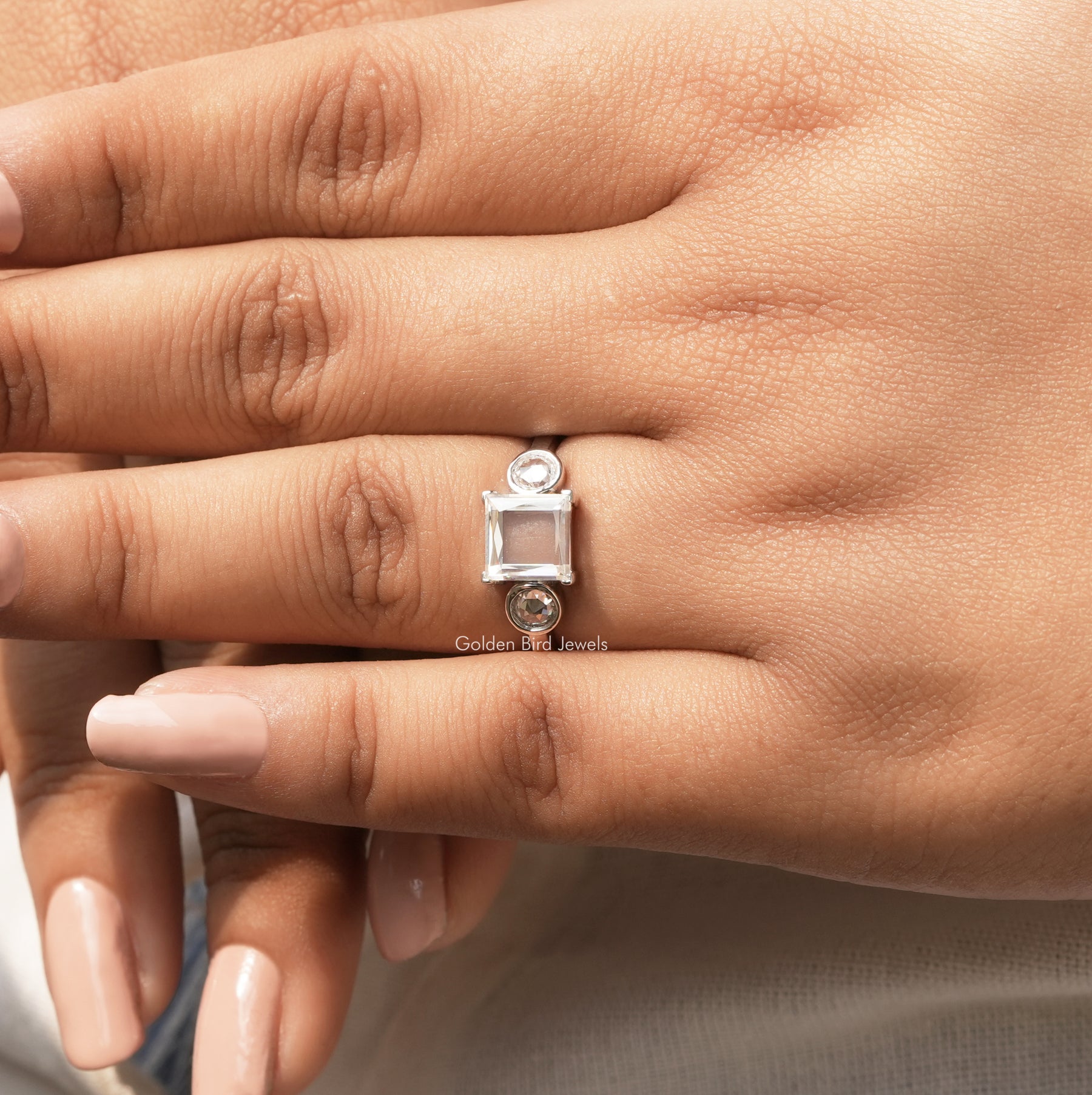 Close-Up View of Moissanite Portrait Cut Princess Engagement Ring In White Gold
