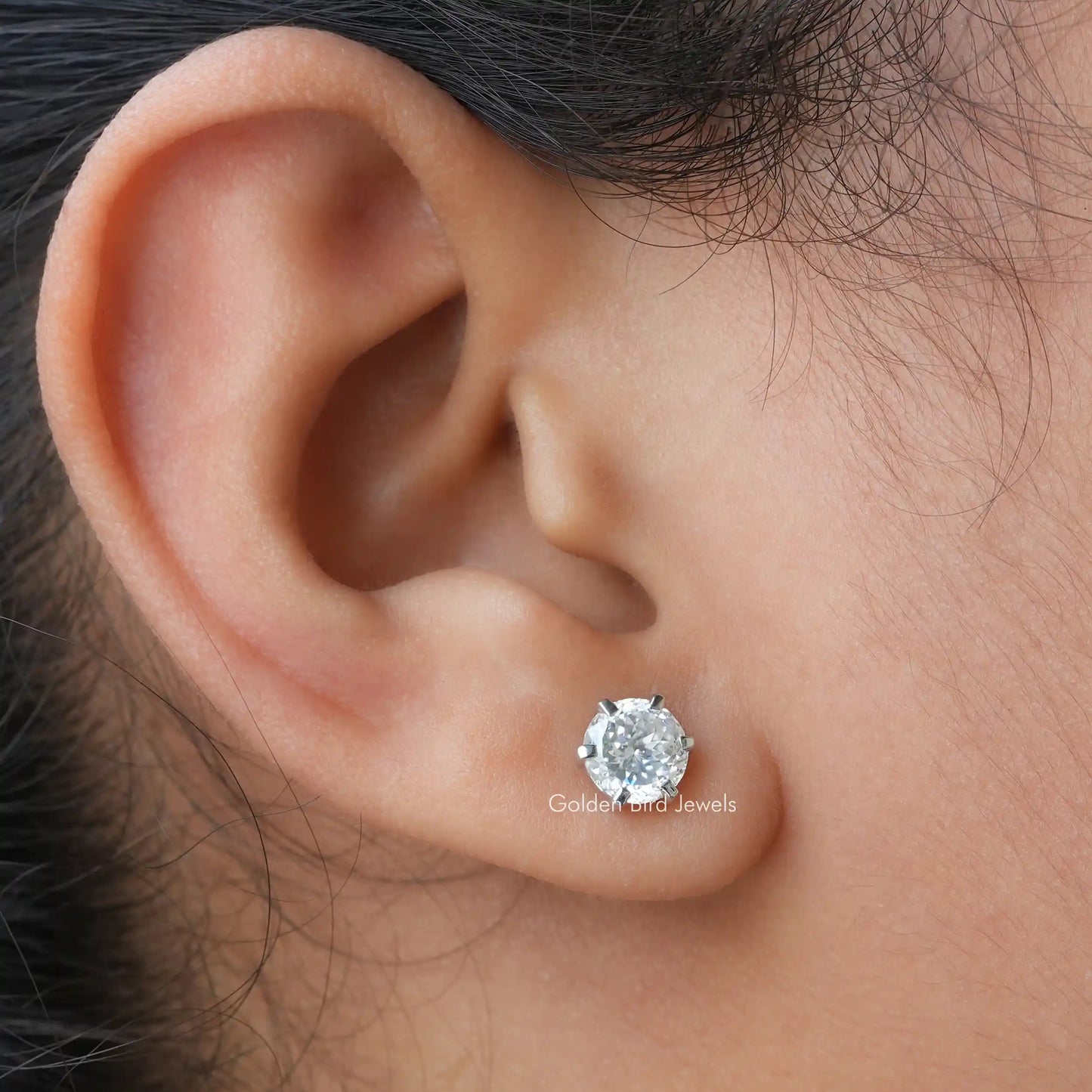 In ear front view Portuguese cut stud earrings in VVS clarity