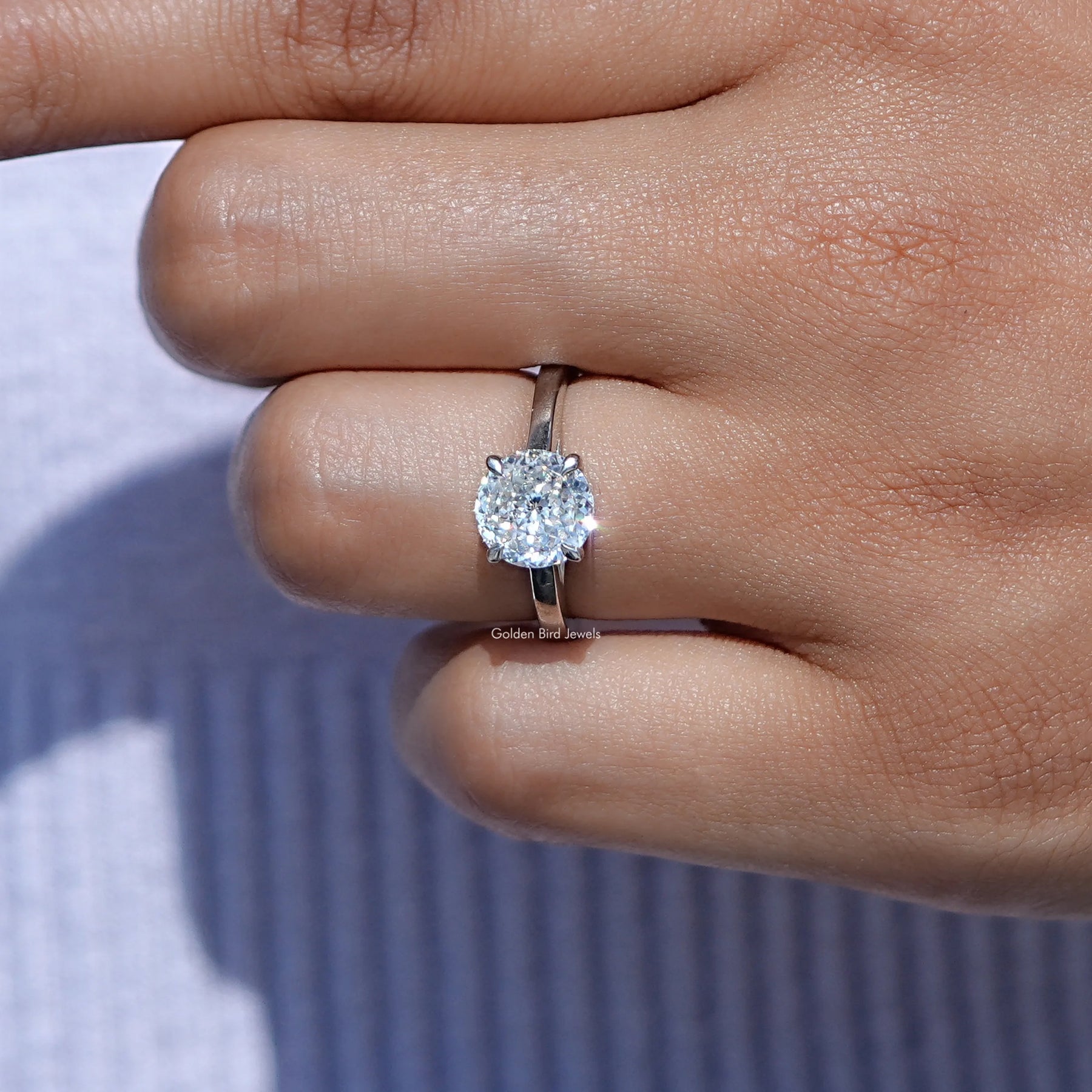 View of Portuguese cut Moissanite Ring in prongs setting 
