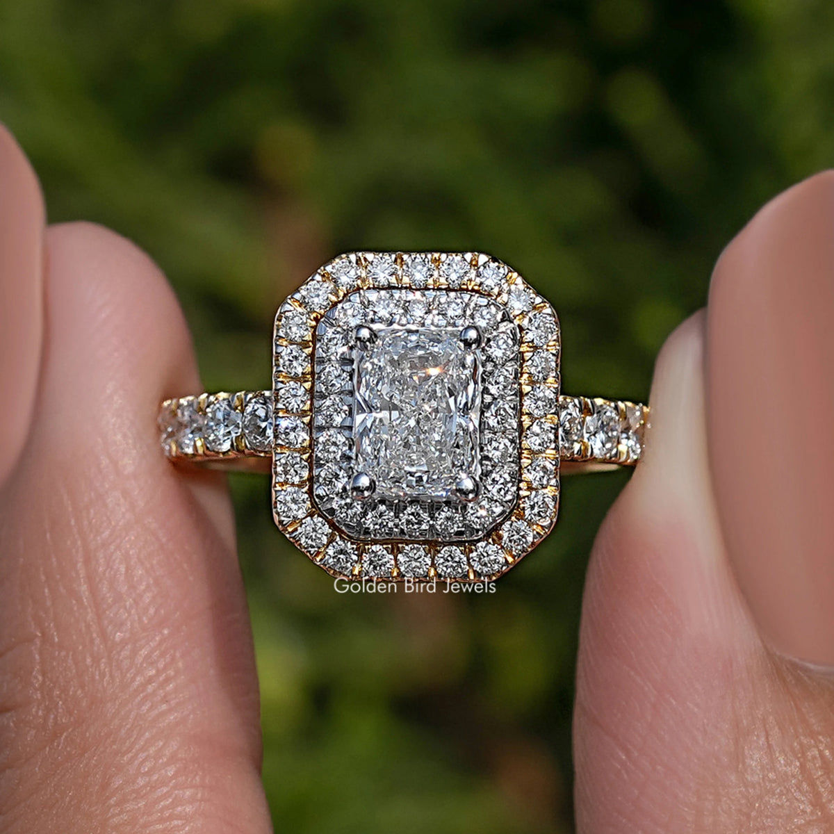 Radiant cut diamond double halo engagement ring with pavé band