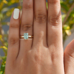 Close-Up View of Radiant Cut Moissanite Solitare Engagement Ring In a finger 