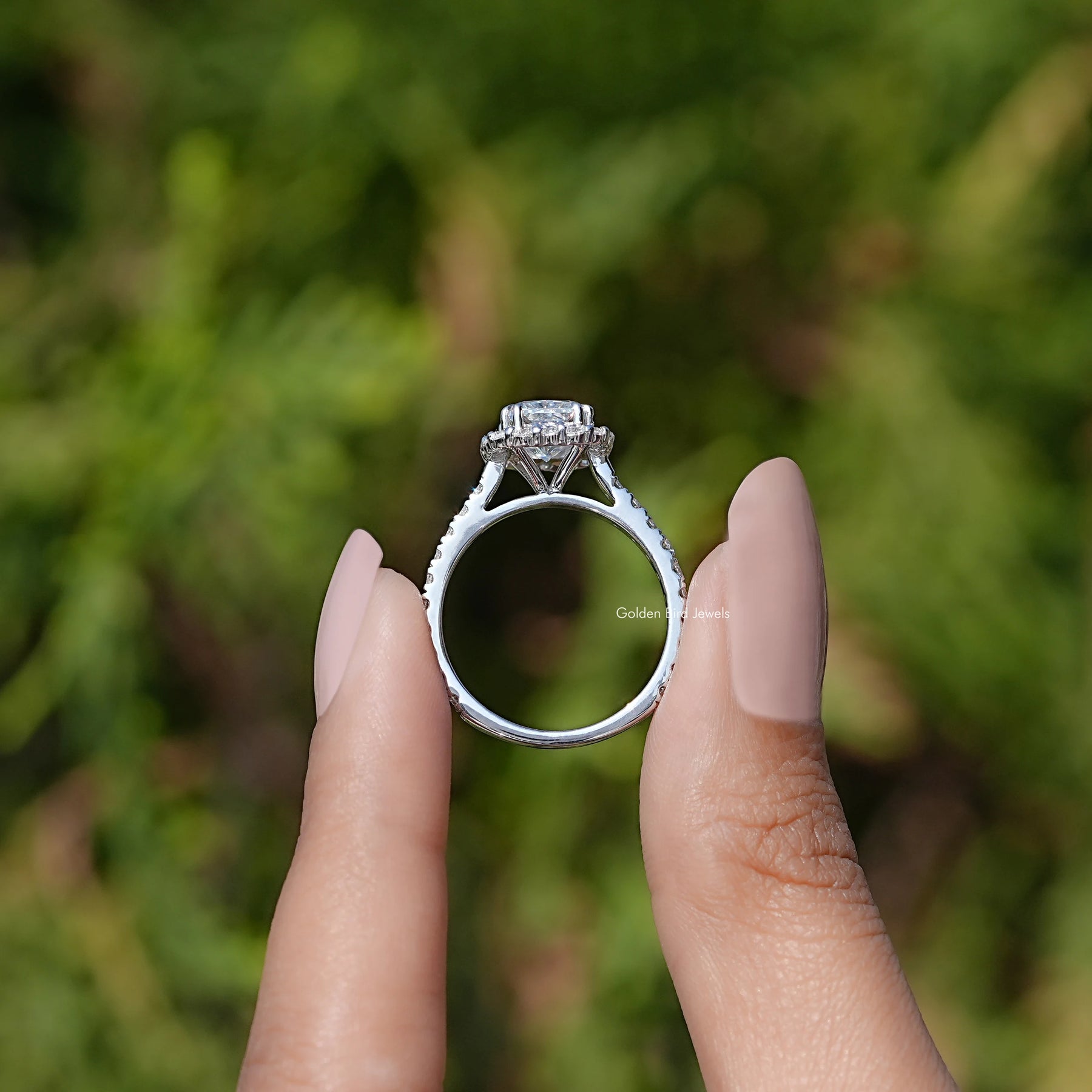 Back view of Halo Accent Engagement Ring in secure setting 
