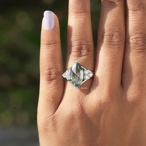 Close-Up View of Rose Cut Marquise   Moissanite Engagement Ring In a finger