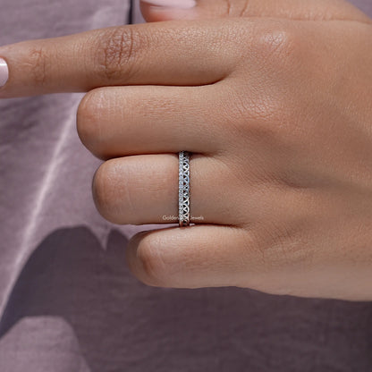 Moissanite stacking band with round stones on a hand
