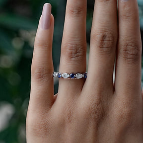 View of Round And Marquise Cut Moissanite Eternity Band In White Gold