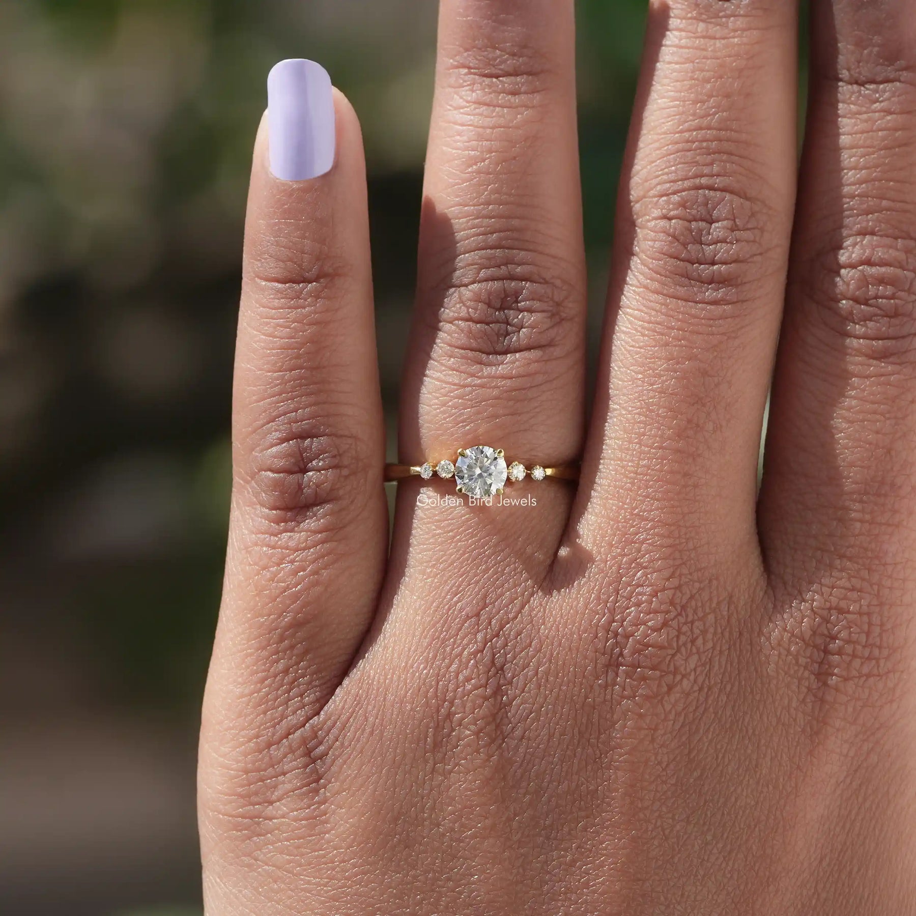 In finger view of Round Cut Lab Diamond Engagement Ring