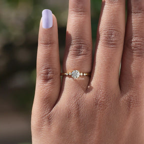 In finger view of Round Cut Lab Diamond Engagement Ring