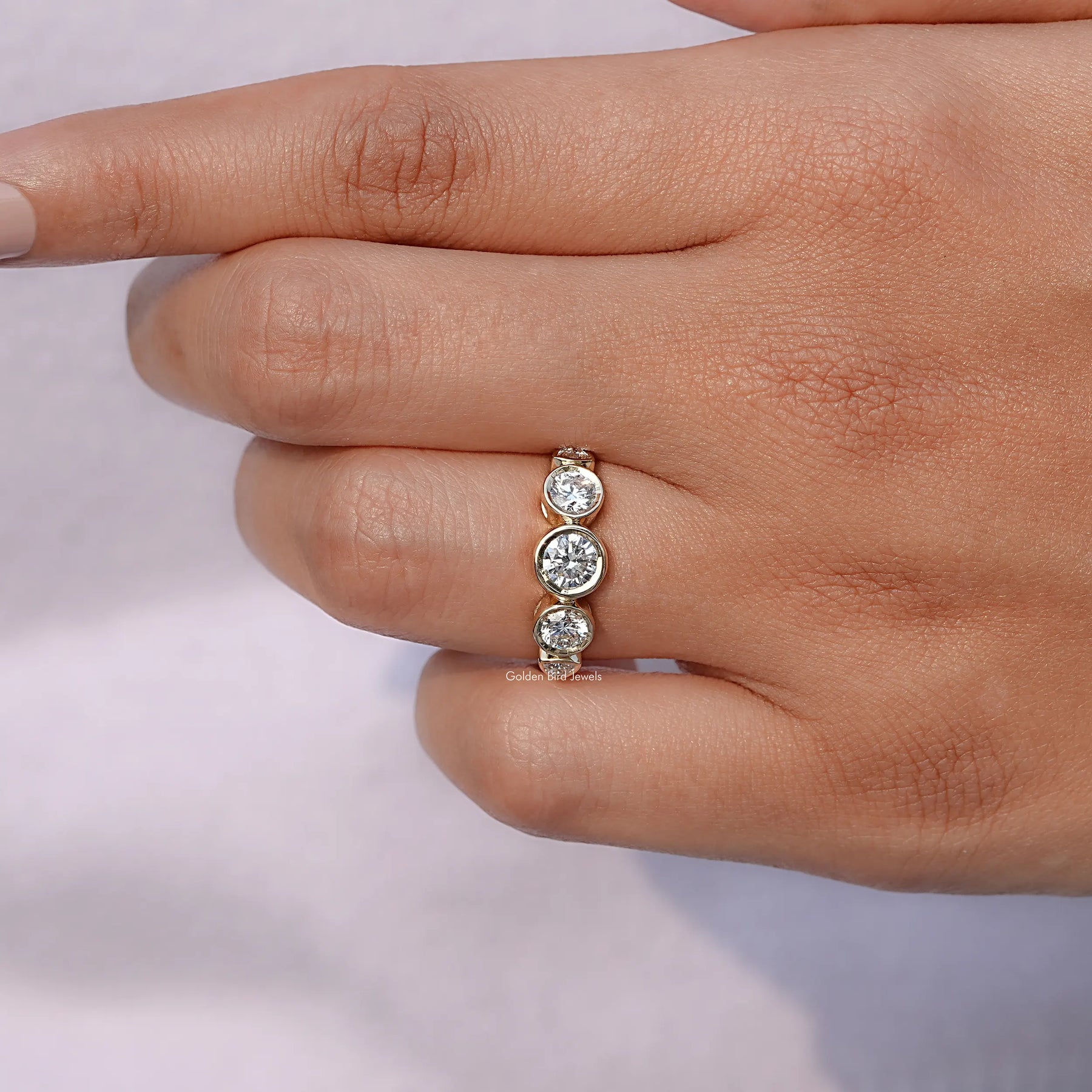 Detailed View of Round Cut Lab Diamond Bezel Set Ring In Yellow Gold