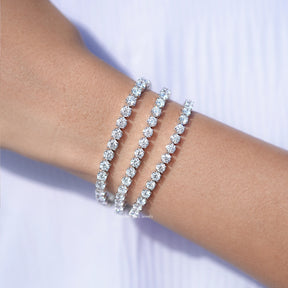 In hand Showing View Of Diamond Tennis Bracelet 