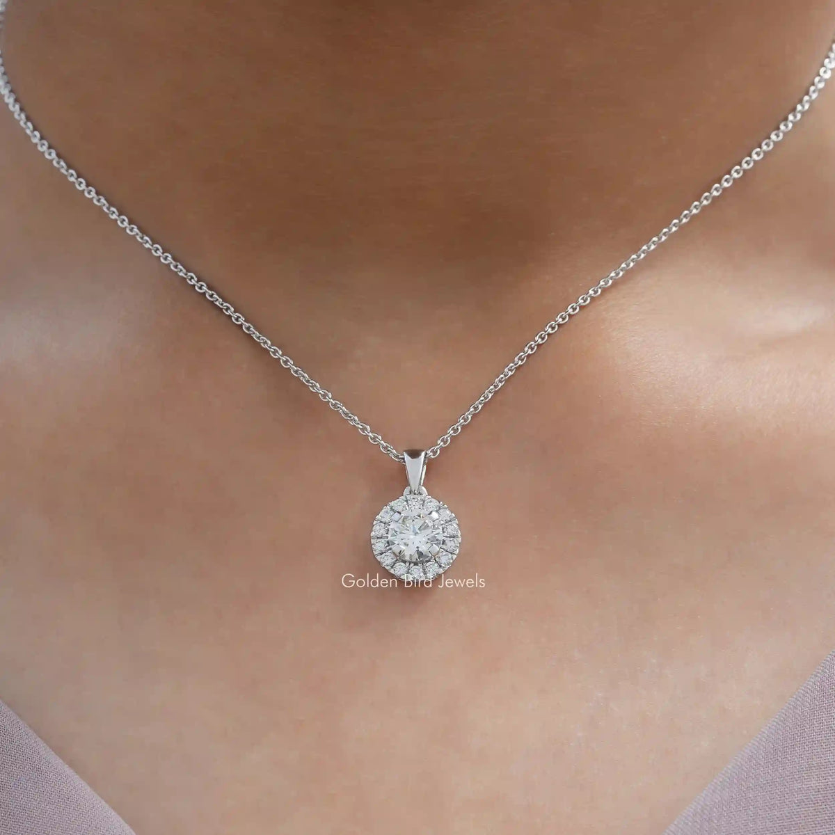 View of round cut lab diamond pendant 