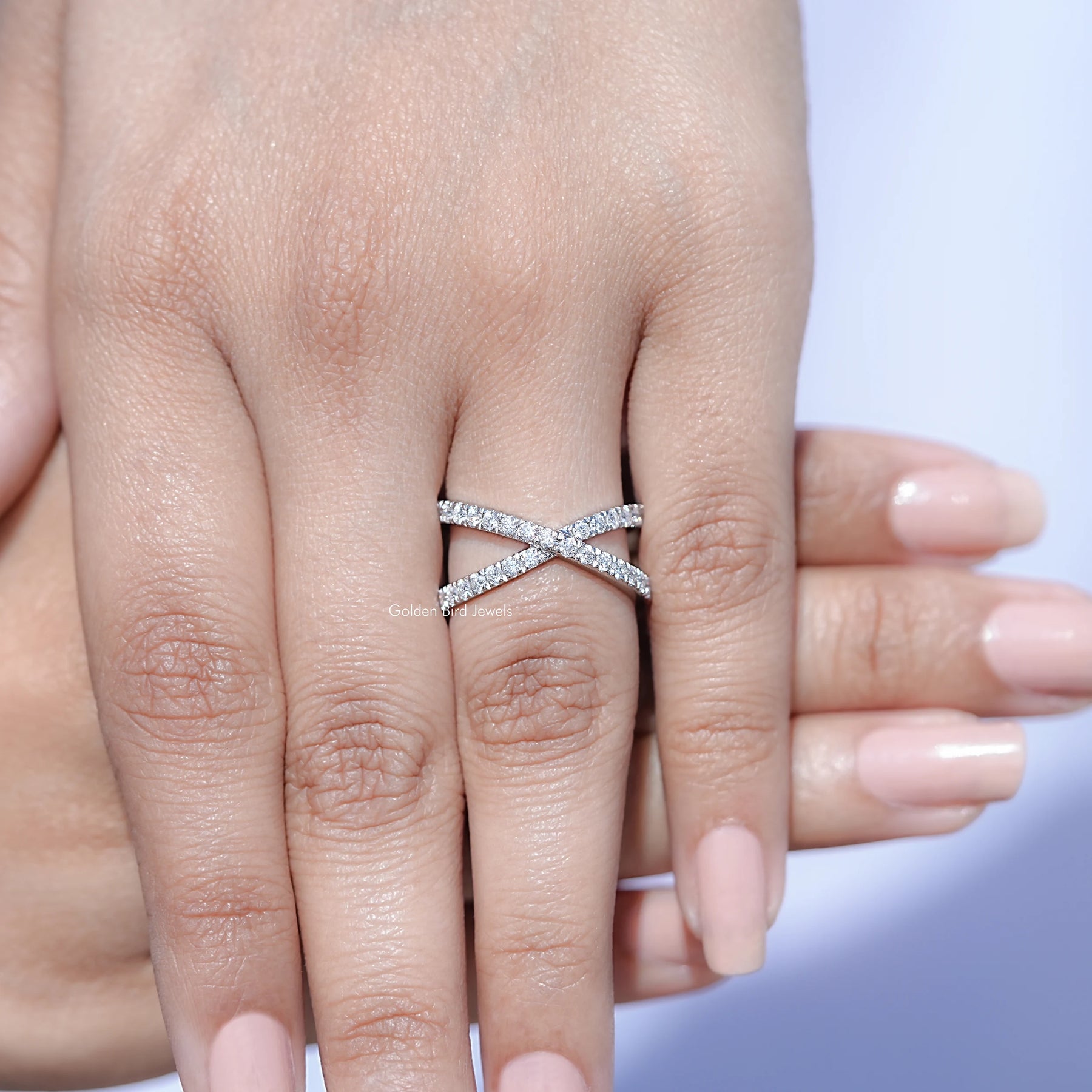 View of solitaire Round Moissanite ring in prongs setting 

