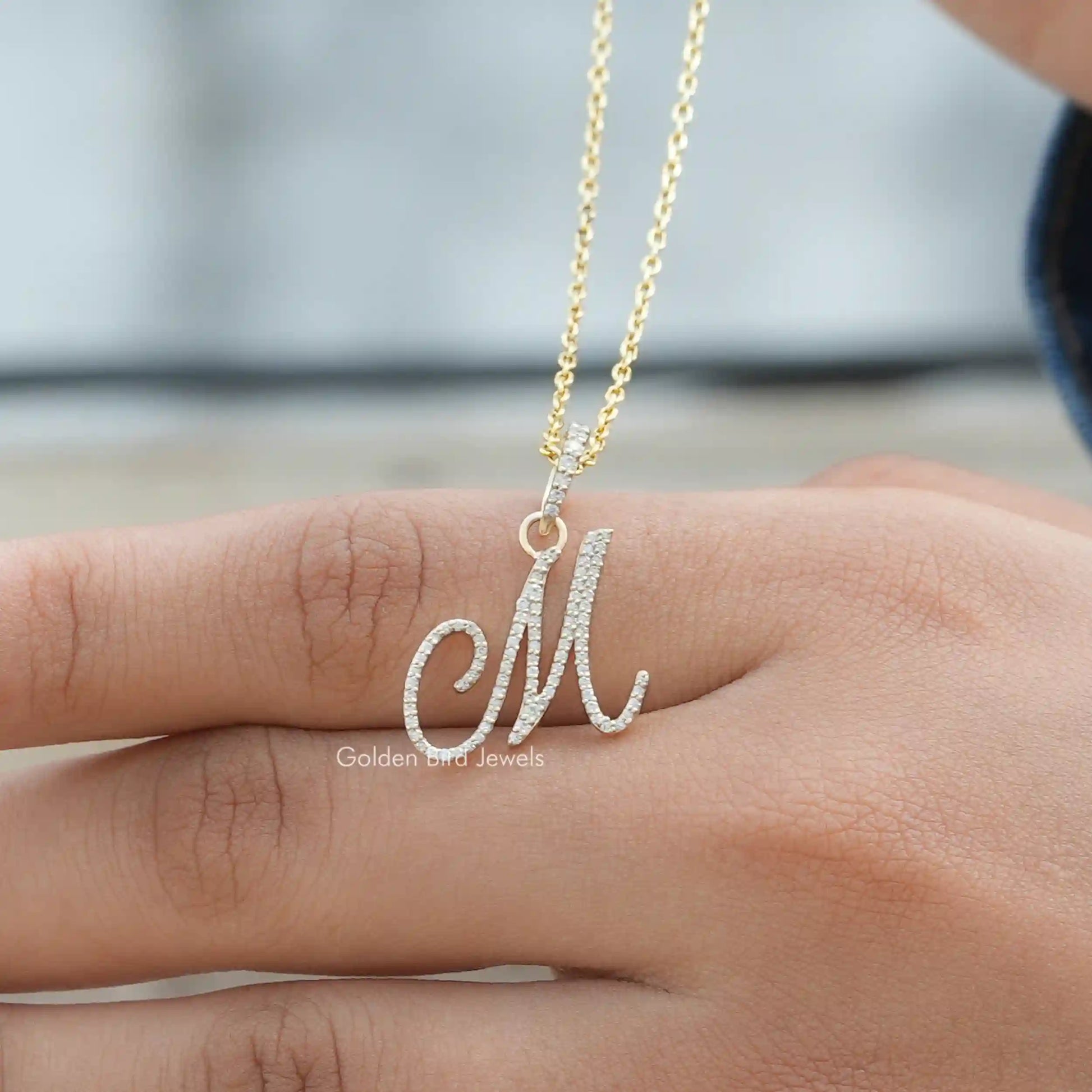 In front view of moissanite round cut pendant