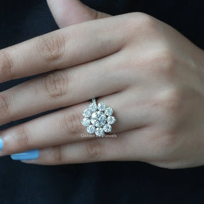 Round Cut Moissanite Floral Halo Engagement Ring In White Gold
