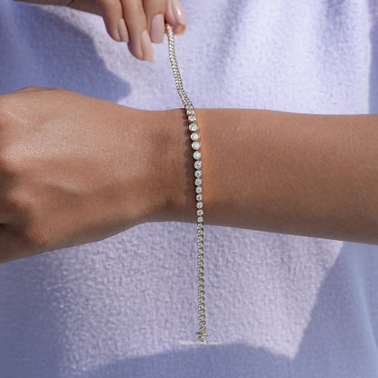 Detailed view of graduated moissanite bracelet