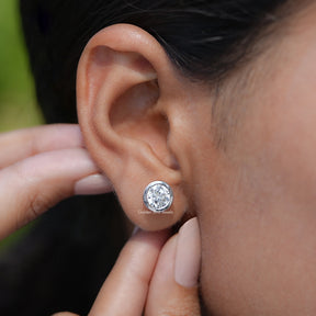 View of Diamond Bezel Set Stud Earrings In White Gold