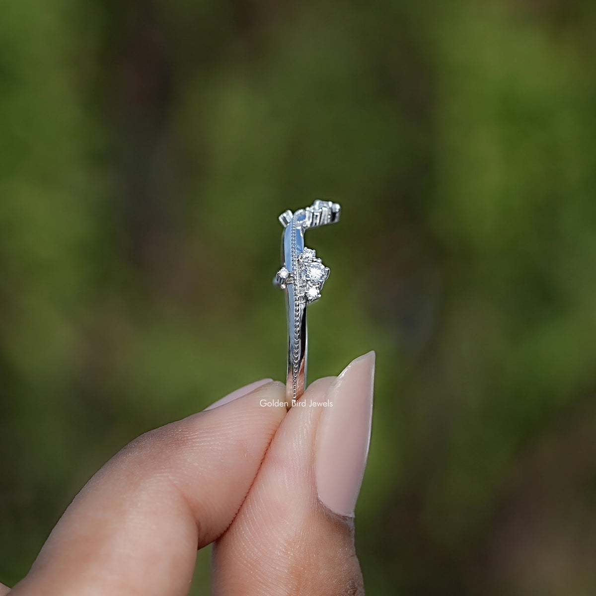 Side View of Round Shape Diamond Curved Band